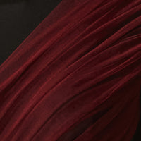 Abito longuette nero con collo dolcevita e drappeggio in tulle bordeaux