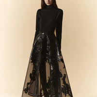 Gonna longuette in organza nera con spalmature in lattice